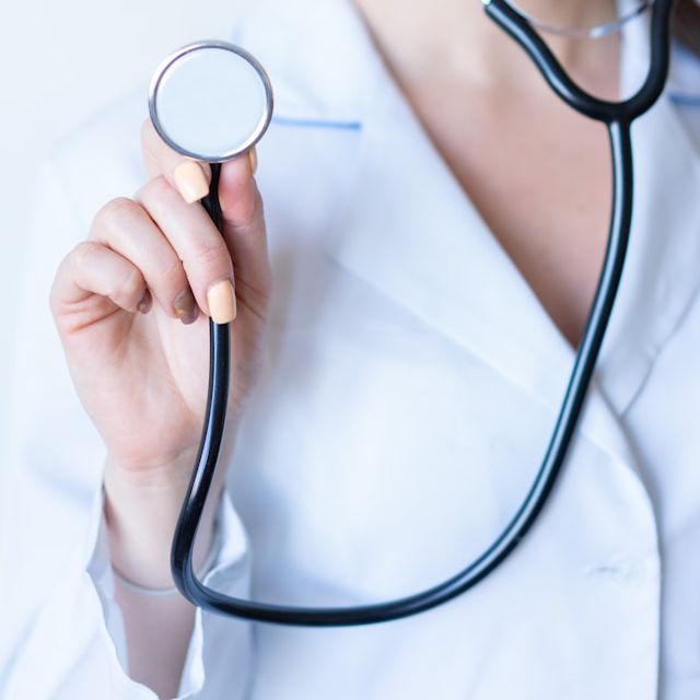 Doctor with stethoscope for Direct Primary Care (DPC).